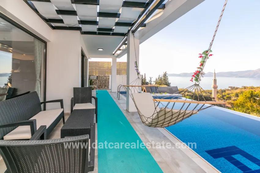 4+1-Zimmer Einfamilienhaus Zu verkaufen in Faralya Bz. Fethiye - 500 m²