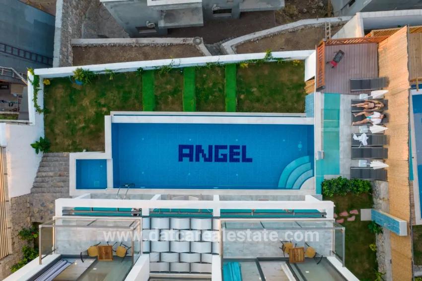 4+1-Zimmer Einfamilienhaus Zu verkaufen in Faralya Bz. Fethiye - 500 m²
