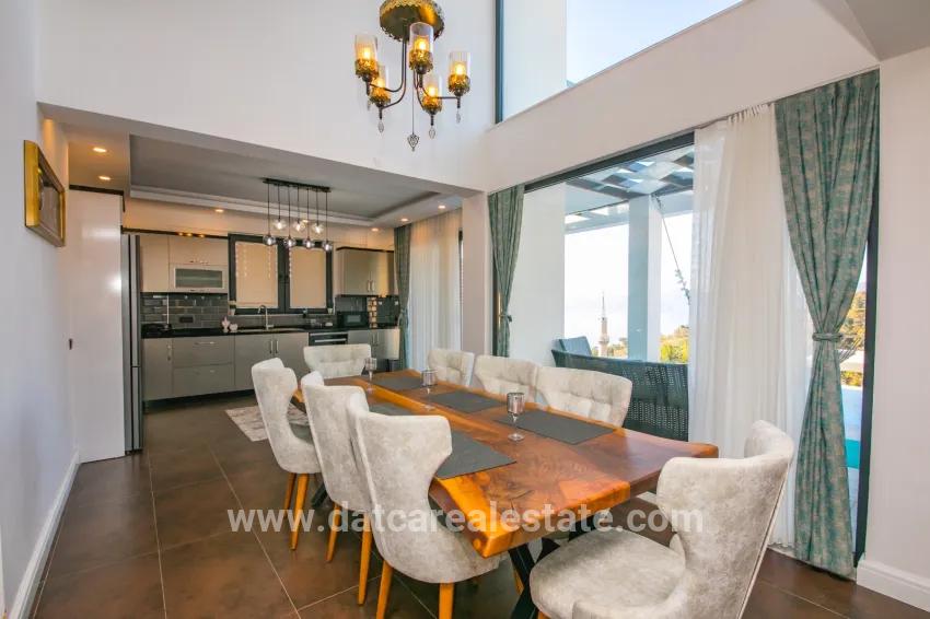 4+1-Zimmer Einfamilienhaus Zu verkaufen in Faralya Bz. Fethiye - 500 m²