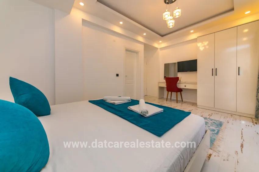4+1-Zimmer Einfamilienhaus Zu verkaufen in Faralya Bz. Fethiye - 500 m²
