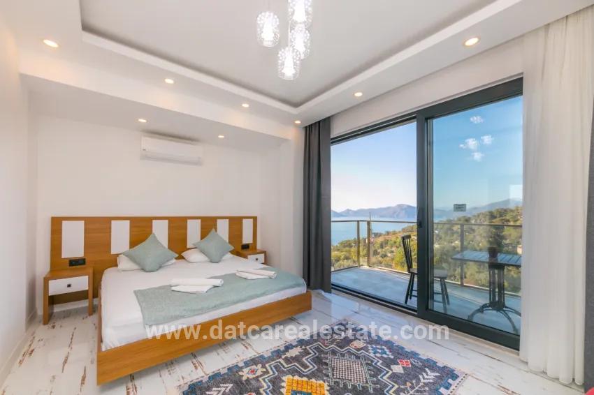 4+1-Zimmer Einfamilienhaus Zu verkaufen in Faralya Bz. Fethiye - 500 m²