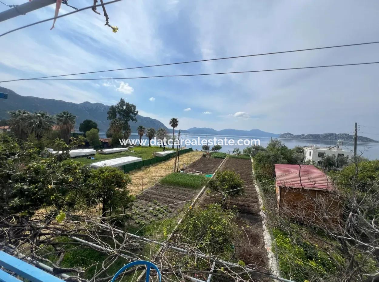 Einfamilienhaus Zum Verkauf Auf Einem 2000M2 Großen Grundstück Am Meer Im Viertel Marmaris Söğüt. Geeignet Zum Festbinden Eines Bootes Davor.