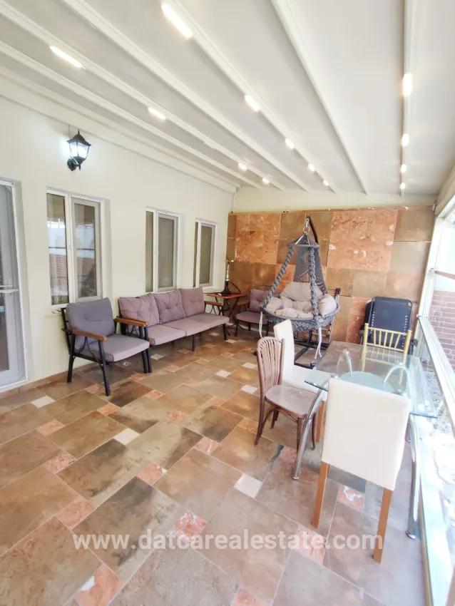 In Çildır neighbourhood, a 2+1 storey garden-owned flat for sale