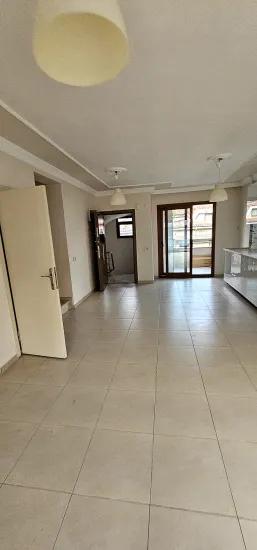 In Beldibi, a spacious and airy 3+1 rental apartment In a brand new building In excellent condition