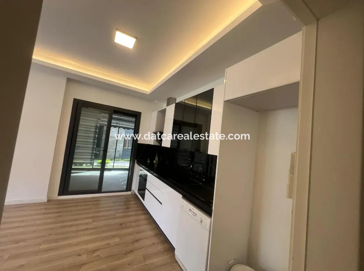 Luxury Apartment For Sale In A Stylish Complex In The Center Of Marmaris, With Ground Floor, Garden, 3 Rooms, 1 Living Room, Parking Lot