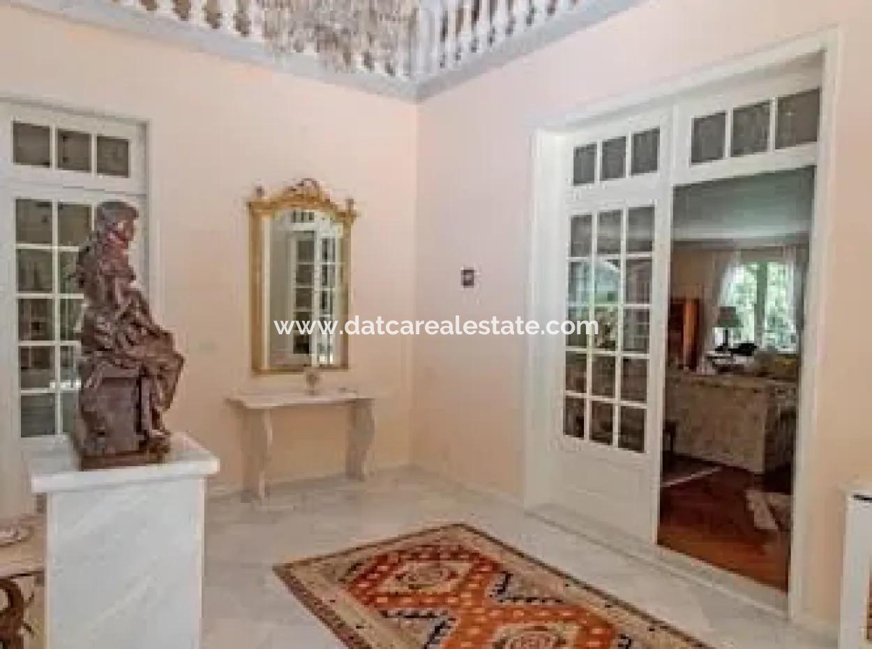 At A Distance Of 10 Km From The Centre Of Marmaris, Built With French Architecture Farm House Is For Sale.