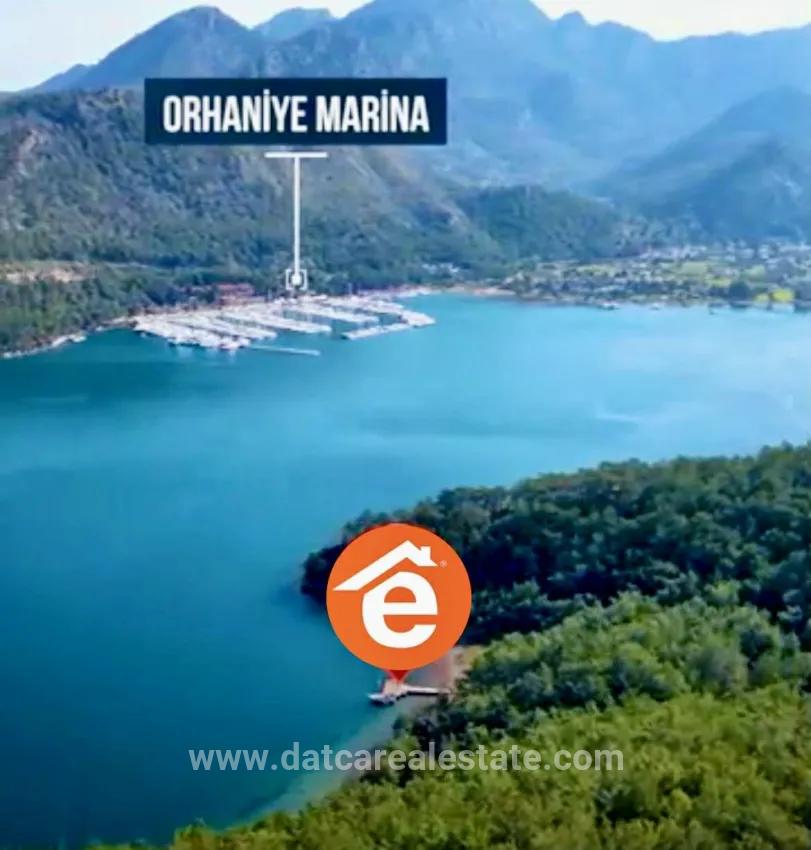 Marmaris Orhaniye mahallesinde 6000 m2 Özel İskelesi mevcut satılık koy