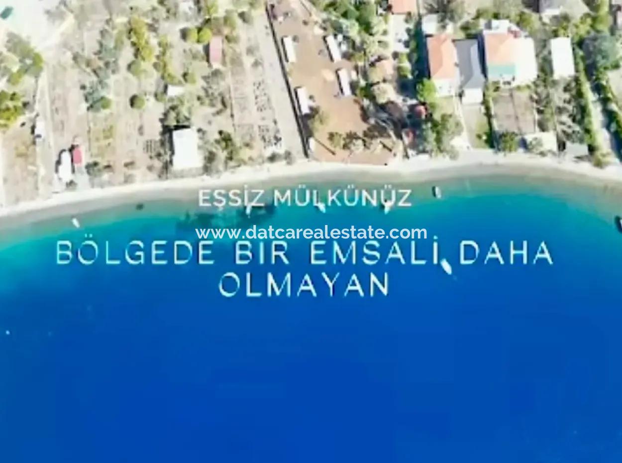 Marmaris Söğüt Mahallesi Denize Sıfır 2000M2 Arsa Satılık Müstakil Ev.önüne Tekne Bağlamaya Uygun.