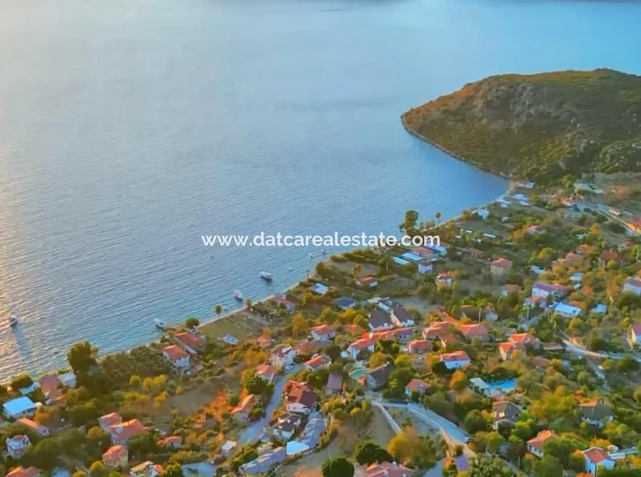 Marmaris Söğüt Mahallesi Denize Sıfır 2000M2 Arsa Satılık Müstakil Ev.önüne Tekne Bağlamaya Uygun.