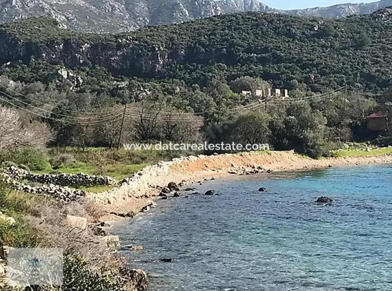 Emlakçıdan Marmaris İlçesi Söğüt Mahallesinde Denize Sıfır 1600 M2 Koy