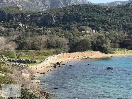 Emlakçıdan Marmaris İlçesi Söğüt Mahallesinde Denize Sıfır 1600 M2 Koy